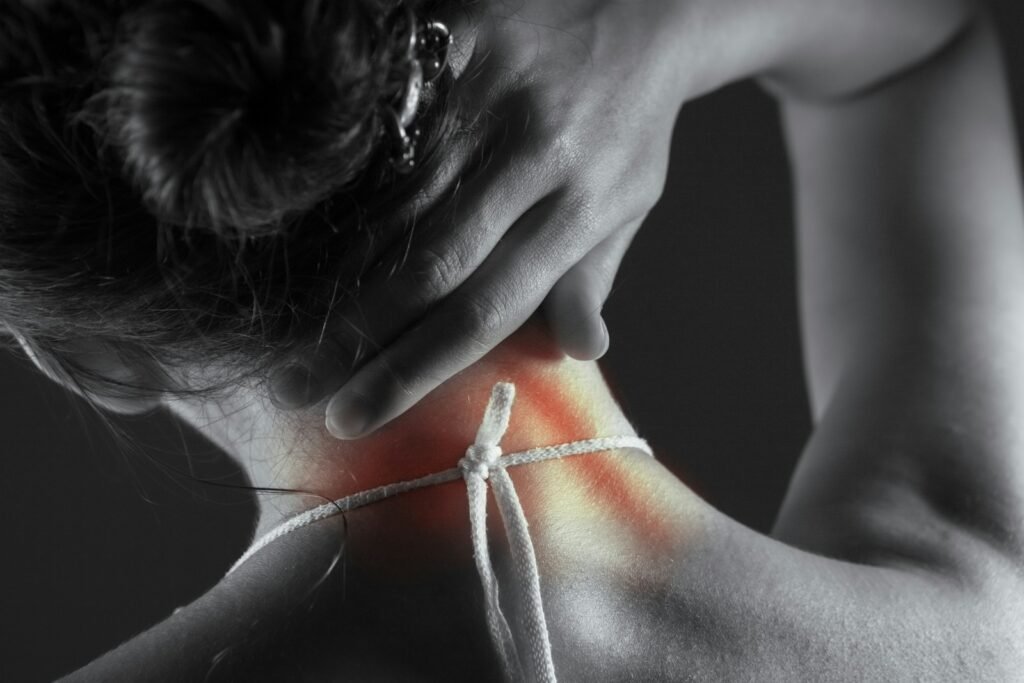 Woman's neck with highlighted pain area